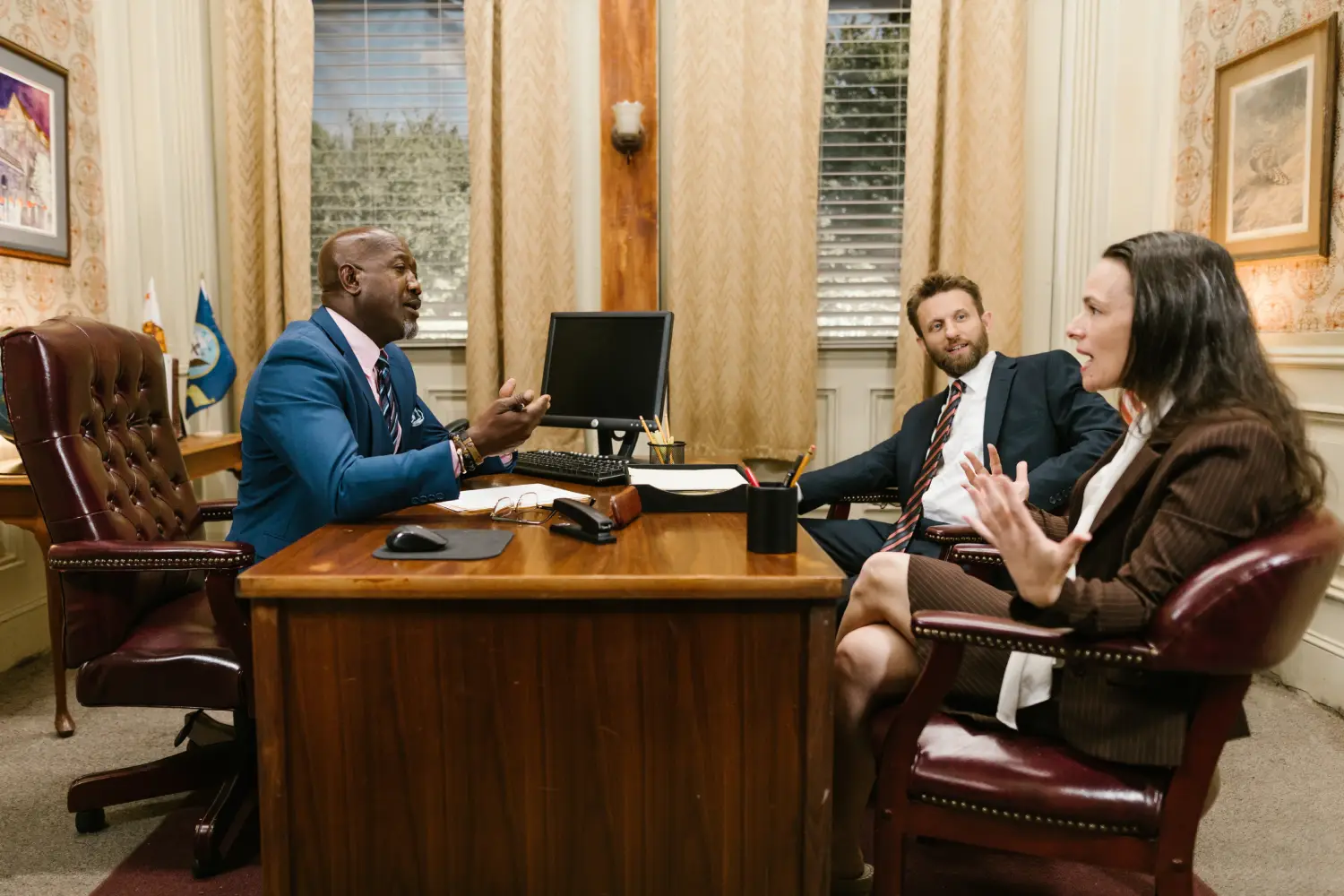 A group of people sitting at a table.