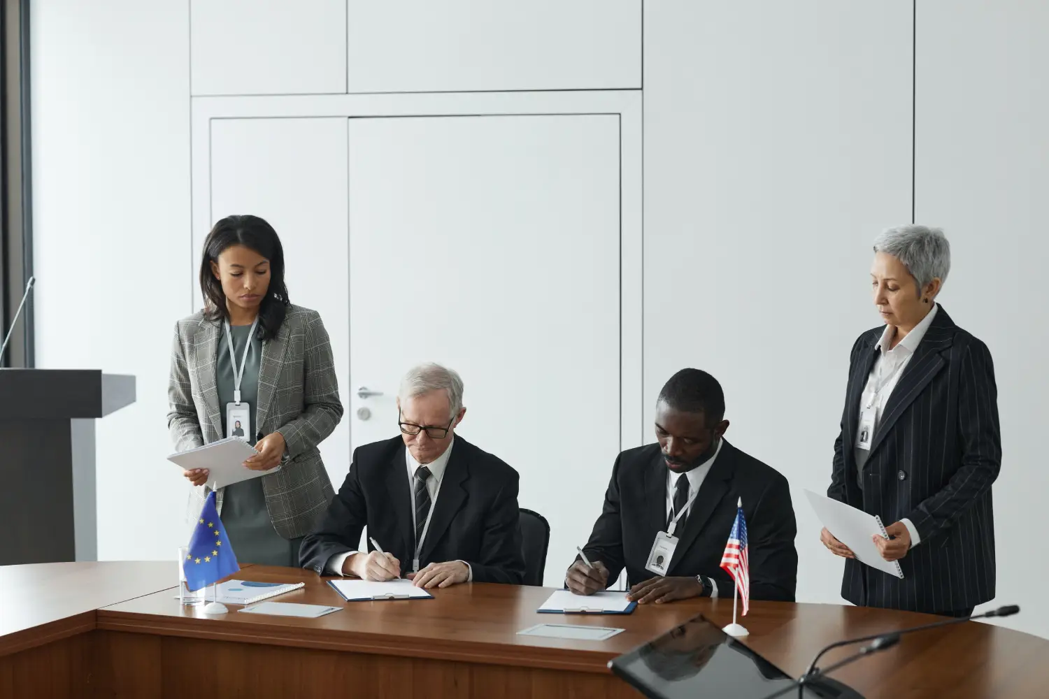 A group of people sitting at a table.